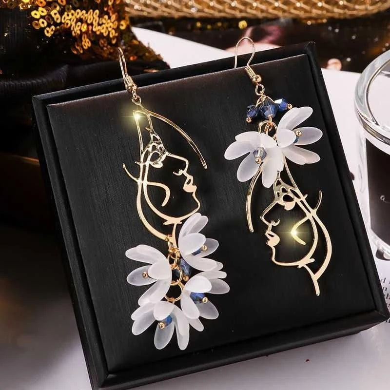 Woman Face Earrings with Gentle Flowers